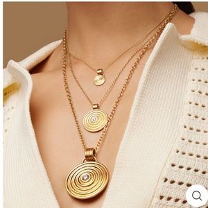 Almasika never worn perfect condition gold with diamond medallion